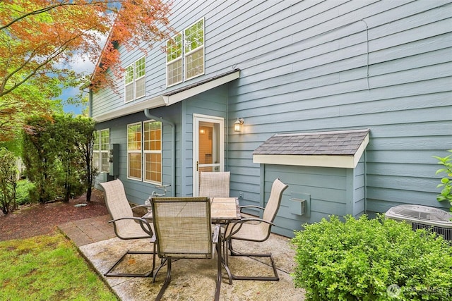 17200 SE 26th Dr Unit P56, Vancouver, WA 98683 - view of patio / terrace with outdoor dining space and cooling unit