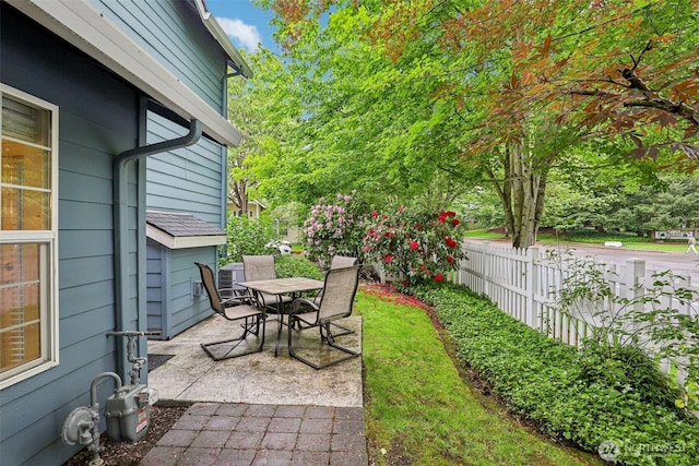 17200 SE 26th Dr Unit P56, Vancouver, WA 98683 - view of patio / terrace featuring outdoor dining area and central air condition unit
