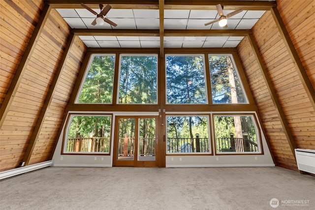 6044 Buckthorn Ct NW, Olympia, WA 98502 - unfurnished living room with plenty of natural light, carpet flooring, ceiling fan, and wood walls