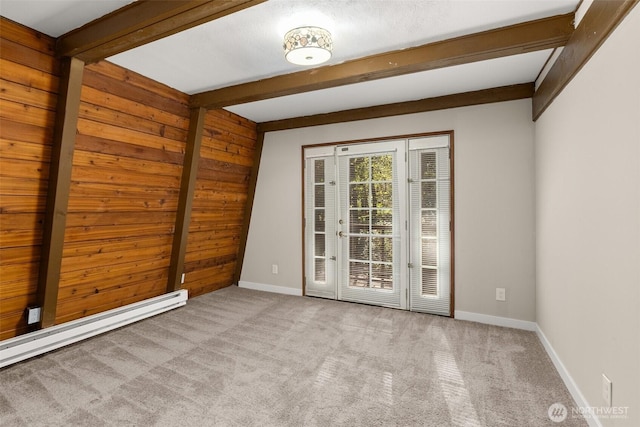 6044 Buckthorn Ct NW, Olympia, WA 98502 - carpeted empty room featuring a baseboard heating unit, wood walls, beam ceiling, and baseboards