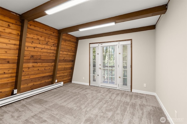 6044 Buckthorn Ct NW, Olympia, WA 98502 - carpeted empty room featuring beamed ceiling, wooden walls, baseboards, and a baseboard radiator