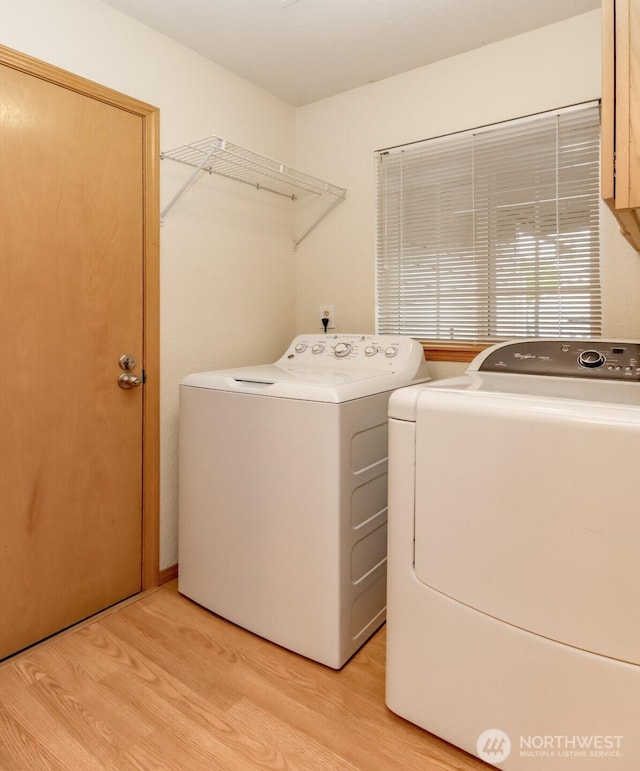 5475 Park Place Loop SE, Lacey, WA 98503 - laundry area featuring independent washer and dryer and light wood finished floors