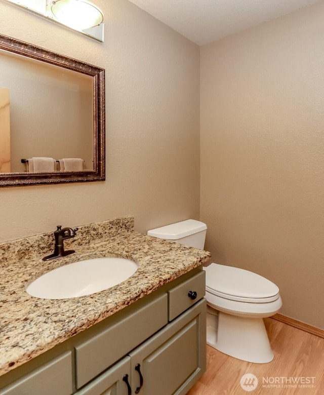 5475 Park Place Loop SE, Lacey, WA 98503 - bathroom with toilet, wood finished floors, and vanity