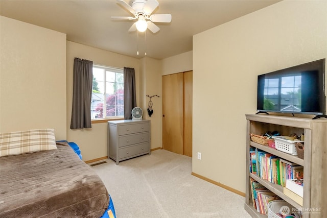 5475 Park Place Loop SE, Lacey, WA 98503 - bedroom with carpet floors, baseboards, and ceiling fan
