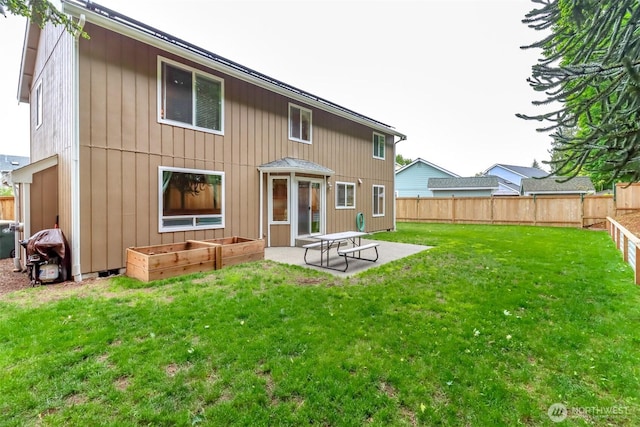 5475 Park Place Loop SE, Lacey, WA 98503 - rear view of house featuring a patio and a vegetable garden
