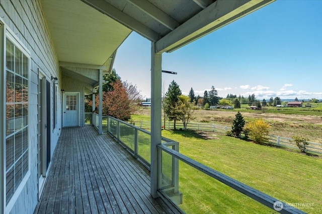 30729 76th Ave NW, Stanwood, WA 98292 - wooden deck featuring a rural view, a lawn, and fence