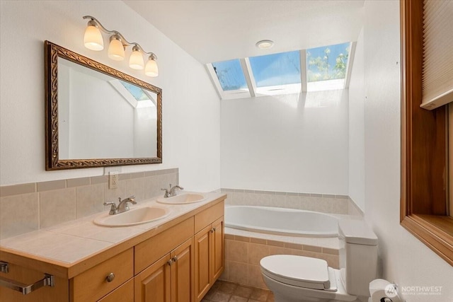 30729 76th Ave NW, Stanwood, WA 98292 - full bath with toilet, tiled bath, a sink, and double vanity