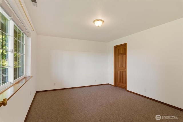 30729 76th Ave NW, Stanwood, WA 98292 - unfurnished room featuring visible vents, baseboards, and carpet floors