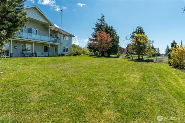 30729 76th Ave NW, Stanwood, WA 98292 - view of yard with a balcony and fence