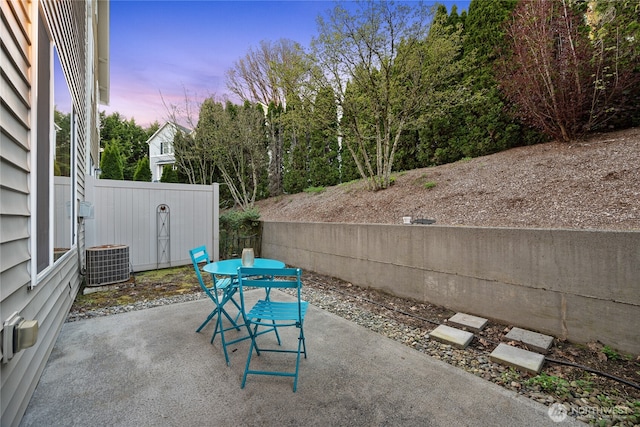 2202 NE 140th St Lot 44, Vancouver, WA 98686 - view of patio with fence, outdoor dining space, and central AC unit