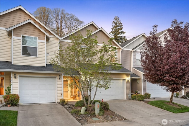 2202 NE 140th St Lot 44, Vancouver, WA 98686 - view of front of house featuring concrete driveway, a garage, and board and batten siding