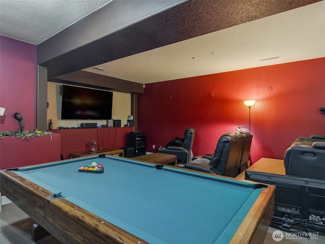 recreation room with carpet floors, visible vents, a textured ceiling, and pool table