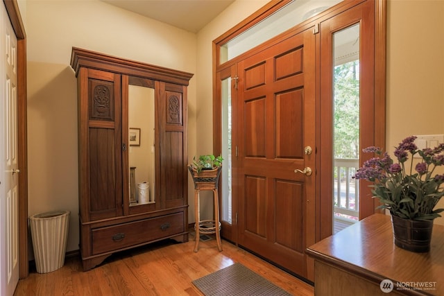 4404 Landmark Dr, Mount Vernon, WA 98274 - foyer featuring light wood finished floors and a healthy amount of sunlight