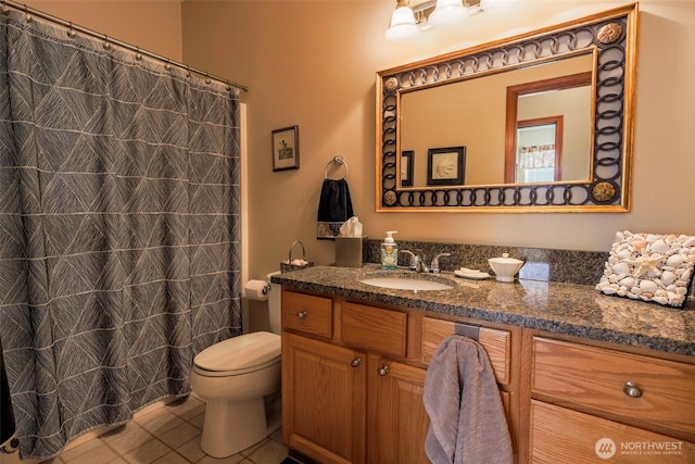 4404 Landmark Dr, Mount Vernon, WA 98274 - bathroom with curtained shower, tile patterned flooring, vanity, and toilet
