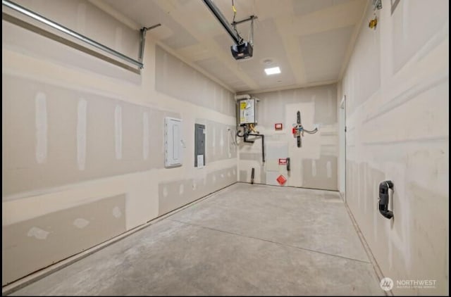 garage with electric panel, water heater, and a garage door opener