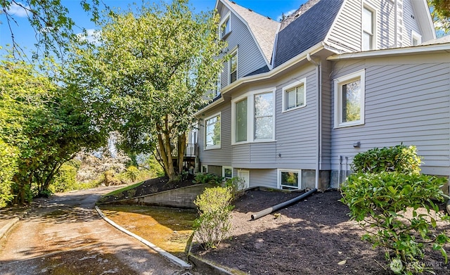 3512 Grand Ave, Everett, WA 98201 - view of home's exterior with roof with shingles and a gambrel roof