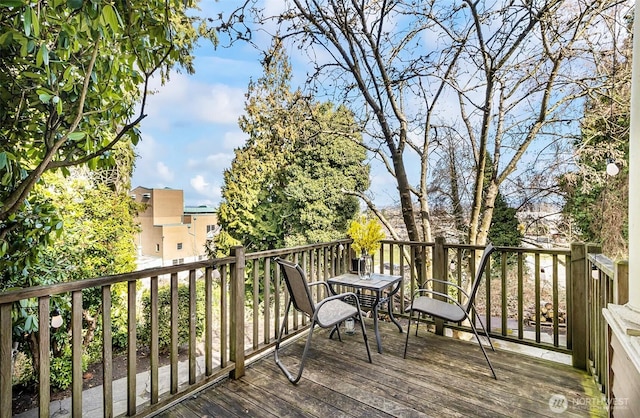 3512 Grand Ave, Everett, WA 98201 - wooden deck with outdoor dining area