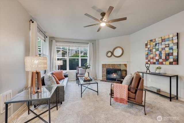 3116 164th St SW Unit 2101, Lynnwood, WA 98087 - carpeted living area with a fireplace and a ceiling fan