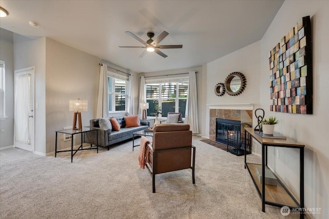3116 164th St SW Unit 2101, Lynnwood, WA 98087 - carpeted living room with ceiling fan, a tile fireplace, and baseboards