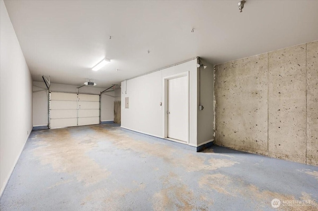 3116 164th St SW Unit 2101, Lynnwood, WA 98087 - garage featuring a garage door opener