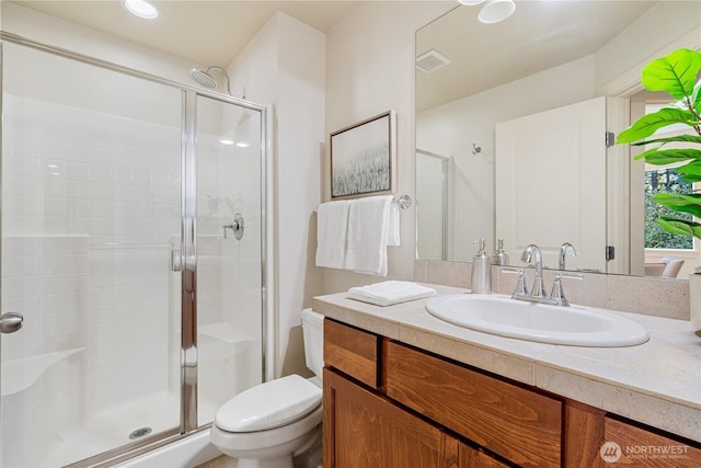 10788 243rd Ave NE, Redmond, WA 98053 - bathroom featuring toilet, a shower stall, and vanity