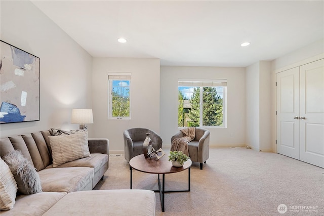 10788 243rd Ave NE, Redmond, WA 98053 - living area featuring light colored carpet, baseboards, and recessed lighting