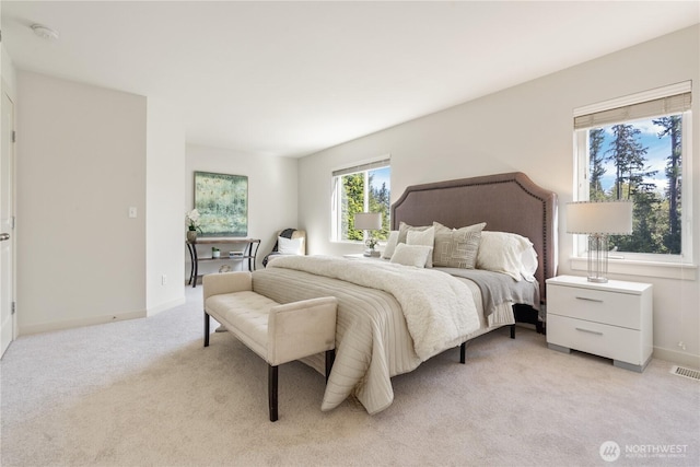 10788 243rd Ave NE, Redmond, WA 98053 - bedroom with light colored carpet and baseboards