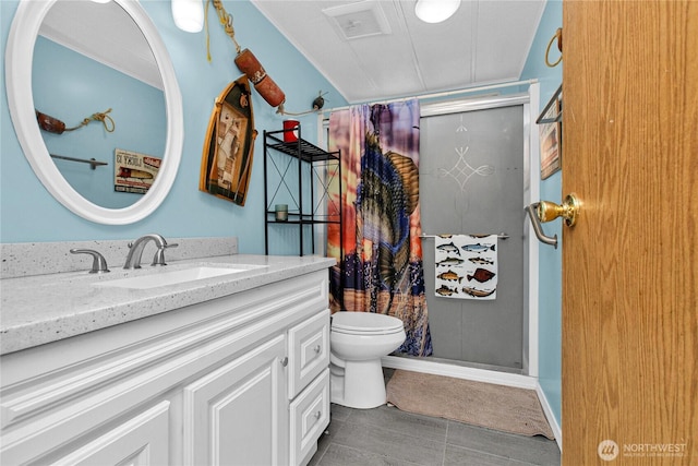 full bath featuring vanity, toilet, tile patterned flooring, and a stall shower