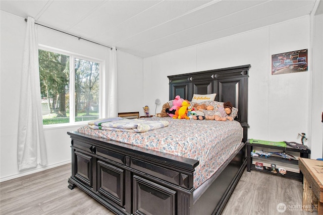 bedroom featuring light wood-type flooring