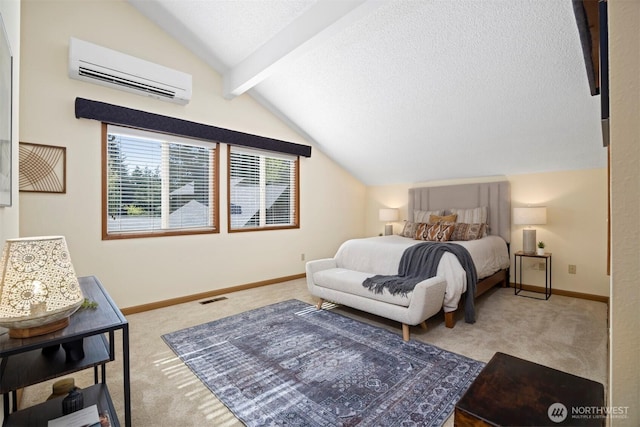 bedroom featuring a wall mounted AC, carpet, baseboards, and a textured ceiling