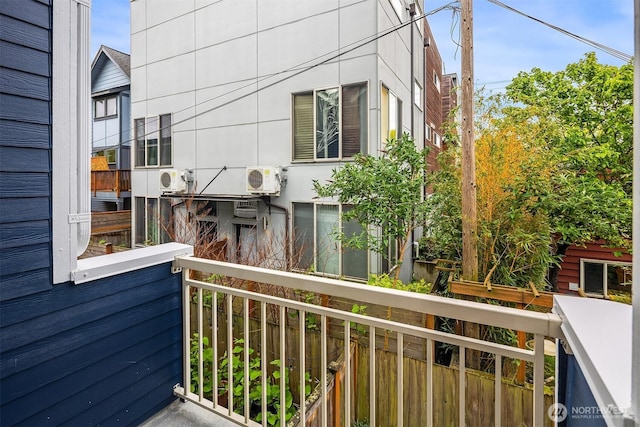 balcony featuring ac unit