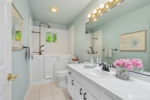 10116 SE 188th St, Renton, WA 98055 - full bathroom featuring a shower, tile patterned floors, vanity, toilet, and a bath