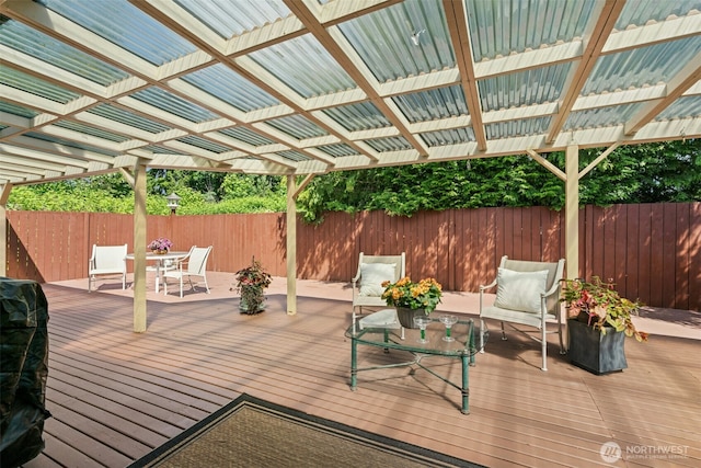 10116 SE 188th St, Renton, WA 98055 - wooden terrace featuring a fenced backyard, outdoor dining space, and a pergola