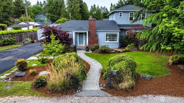 view of front of property with a chimney