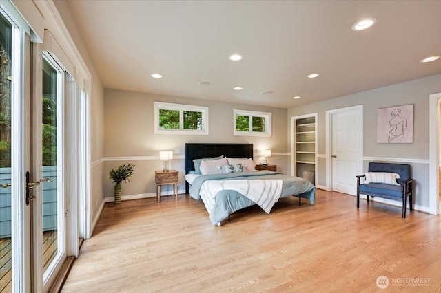 bedroom featuring recessed lighting, baseboards, and light wood-type flooring