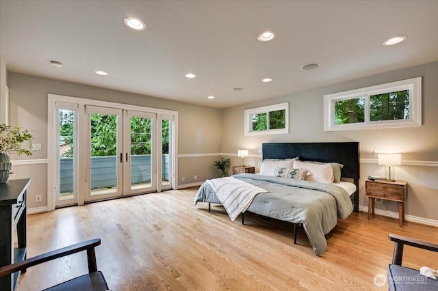 bedroom featuring multiple windows, access to outside, baseboards, and recessed lighting
