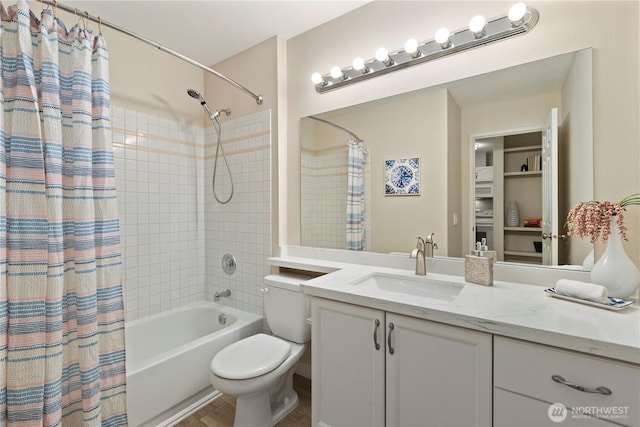 full bathroom with vanity, toilet, and shower / tub combo