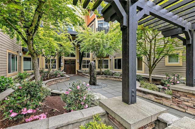 15700 116th Ave NE Unit 205, Bothell, WA 98011 - view of patio with a pergola
