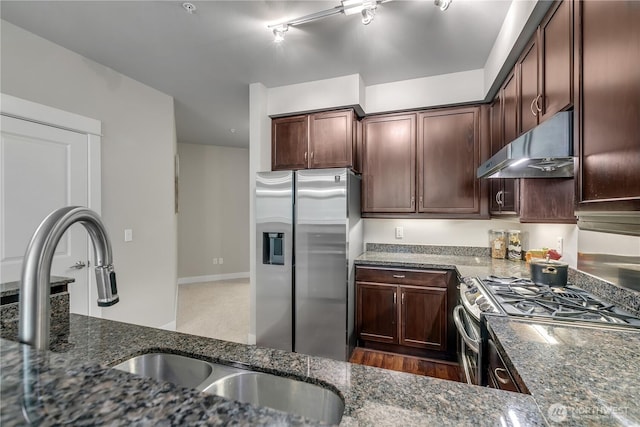 15700 116th Ave NE Unit 205, Bothell, WA 98011 - kitchen featuring under cabinet range hood, dark stone countertops, stove, and stainless steel fridge with ice dispenser