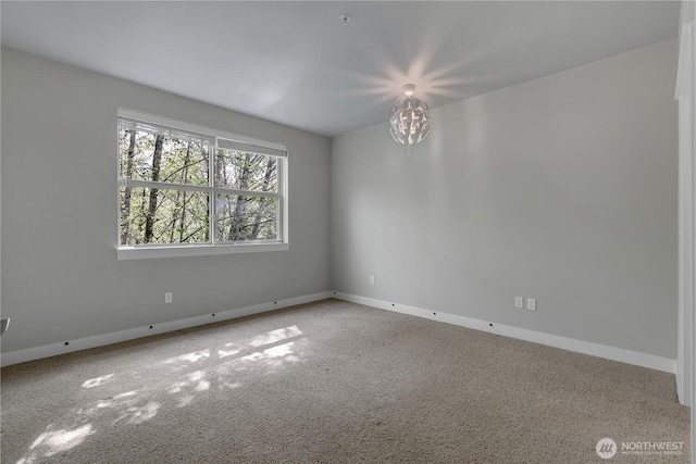 15700 116th Ave NE Unit 205, Bothell, WA 98011 - empty room featuring baseboards and carpet flooring