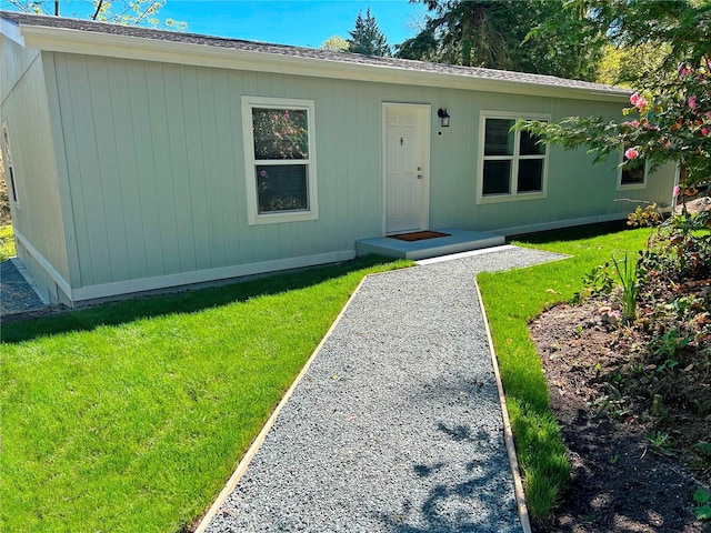 1566 Dallman Rd, Camano Island, WA 98282 - view of front of house featuring a front yard and roof with shingles