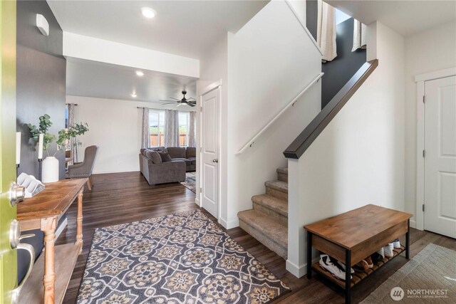 foyer entrance with a ceiling fan, recessed lighting, wood finished floors, and stairway