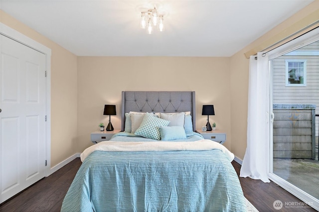 107 20th Ave Unit 306, Seattle, WA 98122 - bedroom with dark wood-type flooring and baseboards