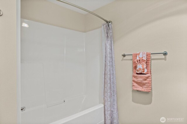 107 20th Ave Unit 306, Seattle, WA 98122 - bathroom featuring shower / bath combo with shower curtain