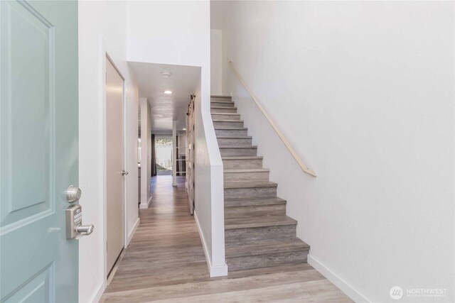 6049 Merlot Ln SE, Lacey, WA 98513 - stairway with baseboards and wood finished floors