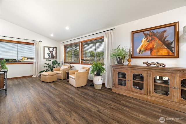 living area featuring baseboards, lofted ceiling, dark wood-style floors, and recessed lighting