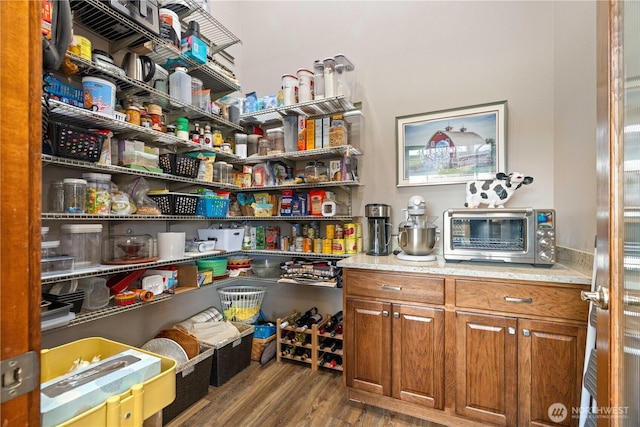 storage area featuring a toaster
