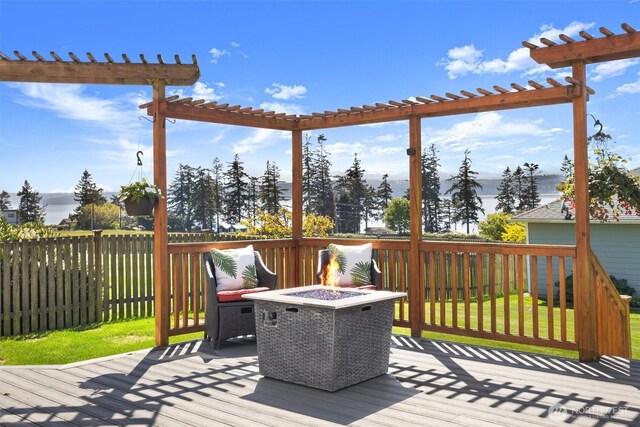 664 Lactrup Spur Ln, Camano Island, WA 98282 - wooden terrace with an outdoor fire pit, fence, and a pergola