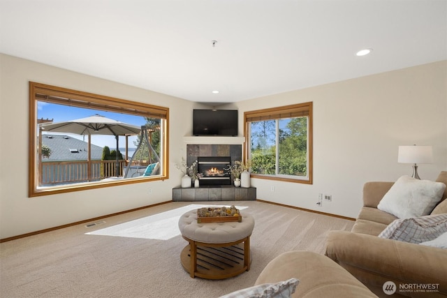 664 Lactrup Spur Ln, Camano Island, WA 98282 - living area with carpet, recessed lighting, baseboards, a tile fireplace, and visible vents