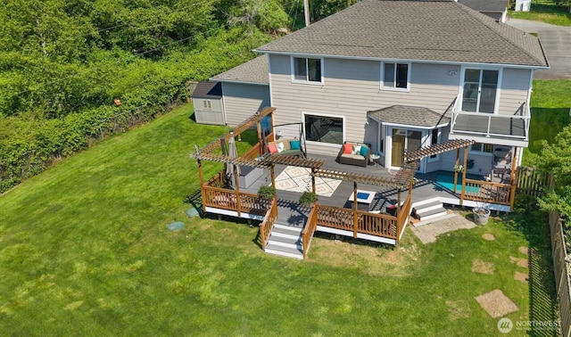 664 Lactrup Spur Ln, Camano Island, WA 98282 - rear view of property featuring a pergola, a shingled roof, a yard, and a deck
